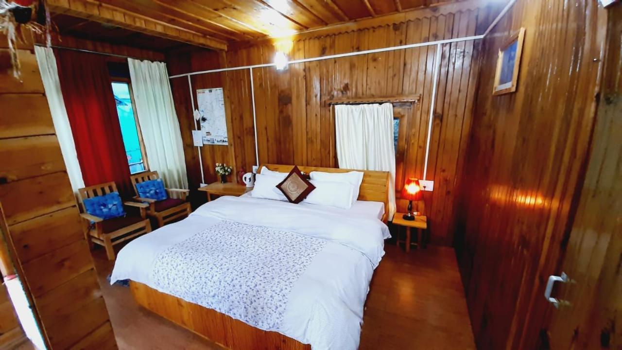 Ishan Log Huts-A Boutique Home Stay Banjar Ngoại thất bức ảnh