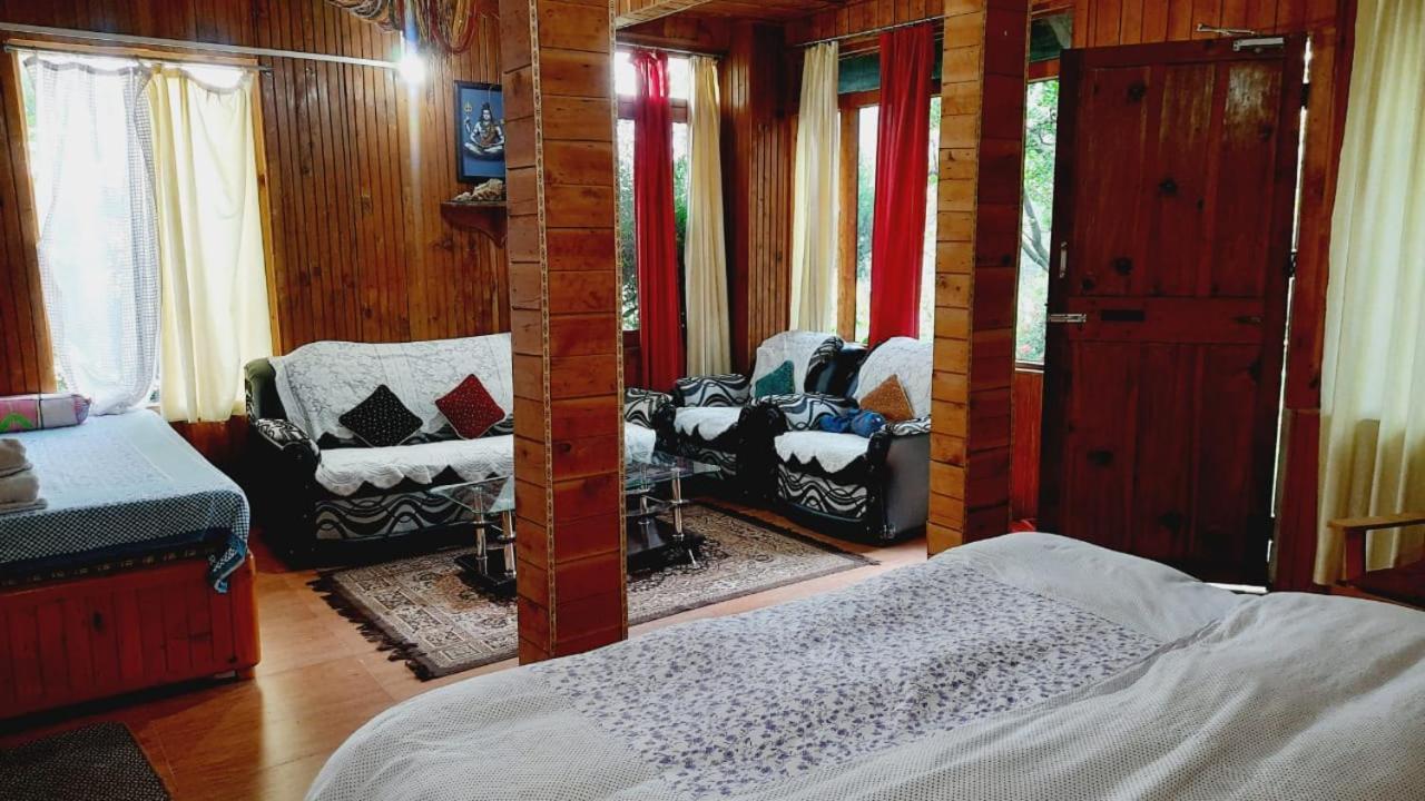 Ishan Log Huts-A Boutique Home Stay Banjar Ngoại thất bức ảnh