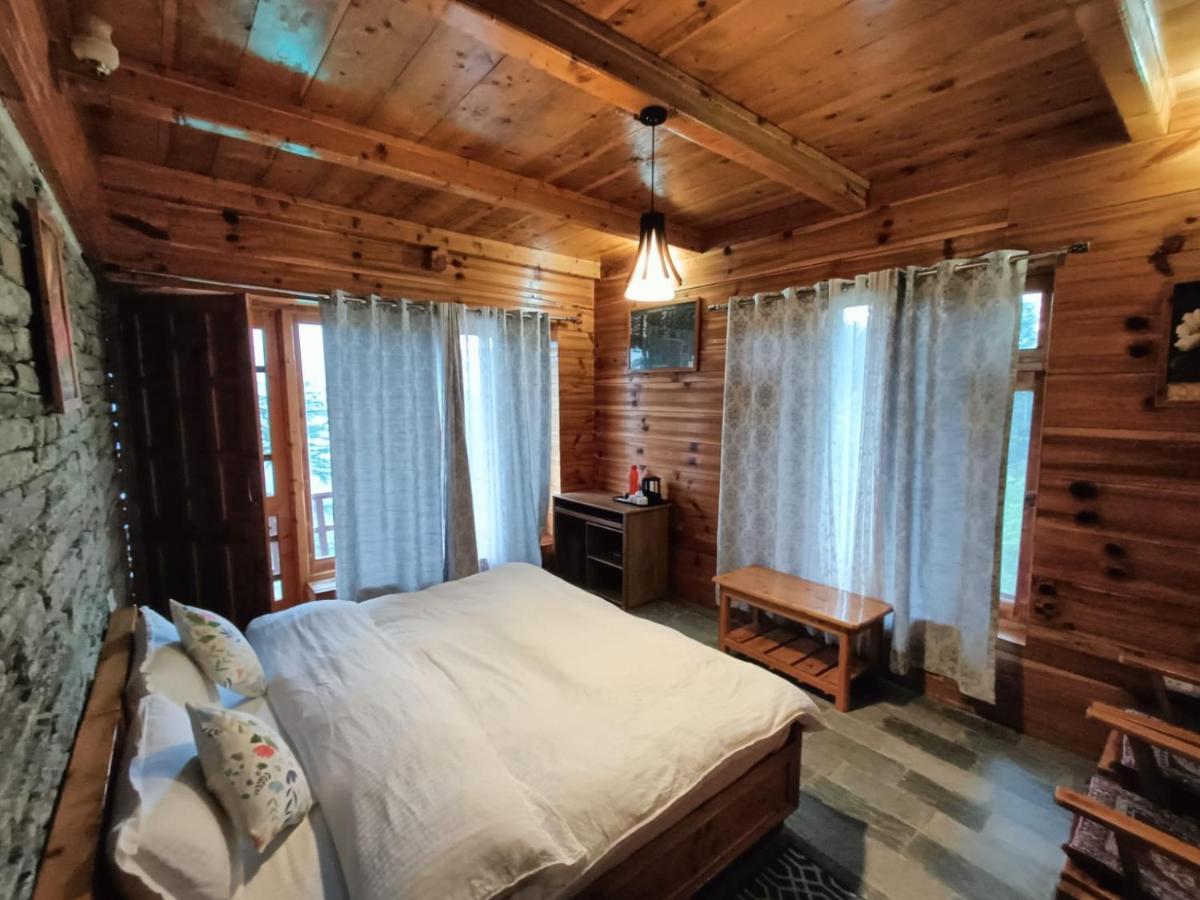 Ishan Log Huts-A Boutique Home Stay Banjar Ngoại thất bức ảnh