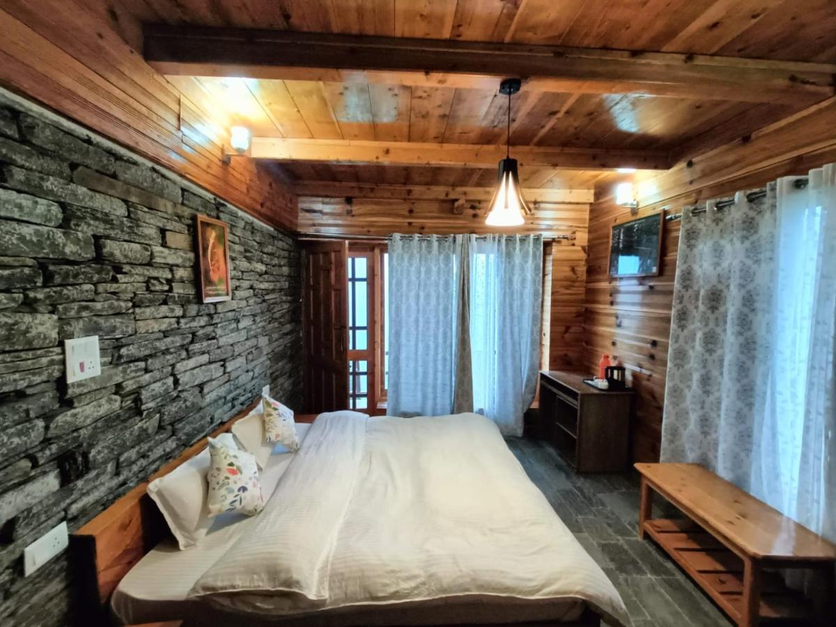 Ishan Log Huts-A Boutique Home Stay Banjar Ngoại thất bức ảnh