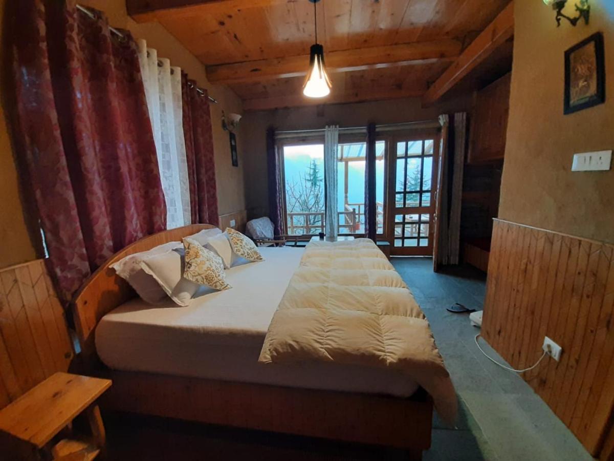 Ishan Log Huts-A Boutique Home Stay Banjar Ngoại thất bức ảnh